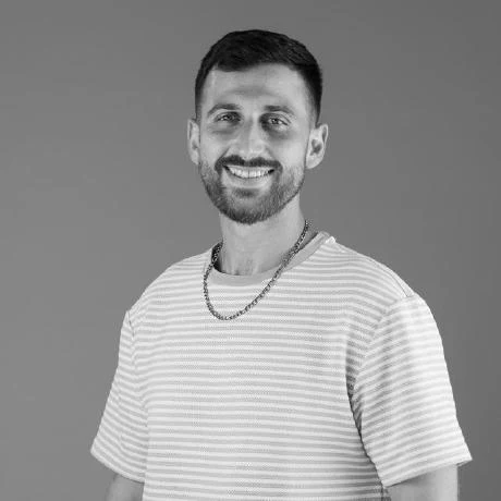Eyal Alfasi smiling outdoors